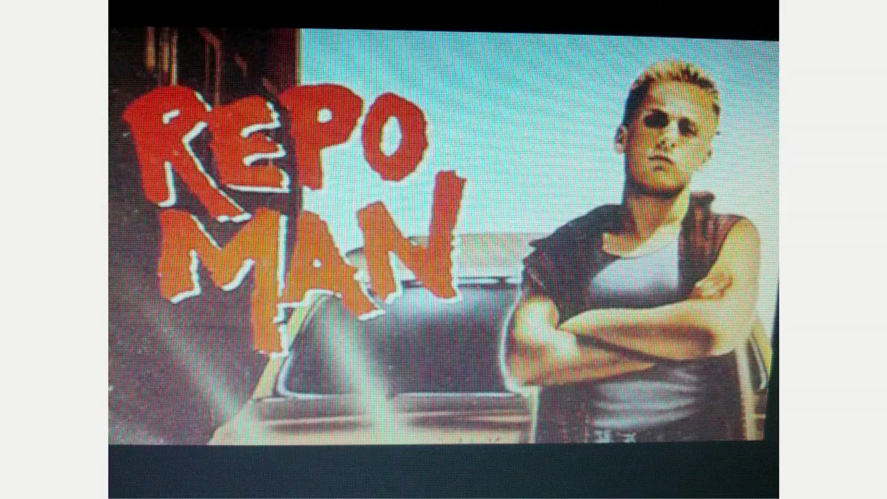 Slide: Repo Man film poster